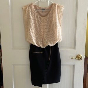 Classy/ business casual mini tank dress with sheer overlay.